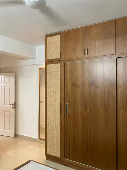 Not loud, not flashy, just standing there being effortlessly elegant. A beautiful sliding wardrobe combining wood grain with textured panels.