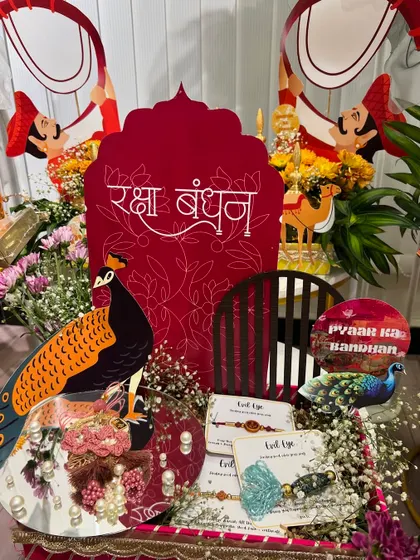 A close-up of the Rakhi platter, showcasing the custom laser-cut signs and the arrangement of Rakhis. Every detail is thoughtfully considered to create a cohesive and festive look.