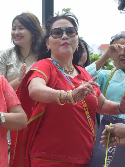 A guest enjoying the music at an outdoor wedding event. Seeing this kind of happiness and freedom in the crowd is what motivates me.