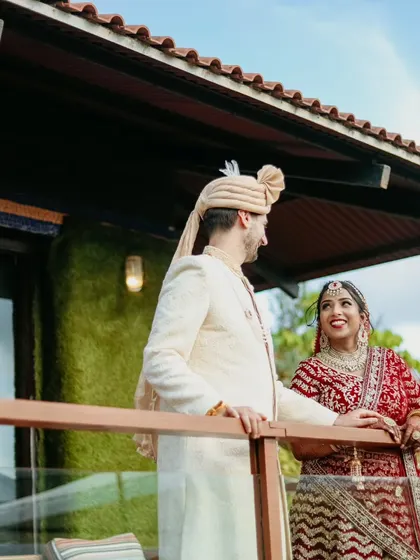 A beautiful portrait capturing a look of love and admiration from the bride to her groom.
