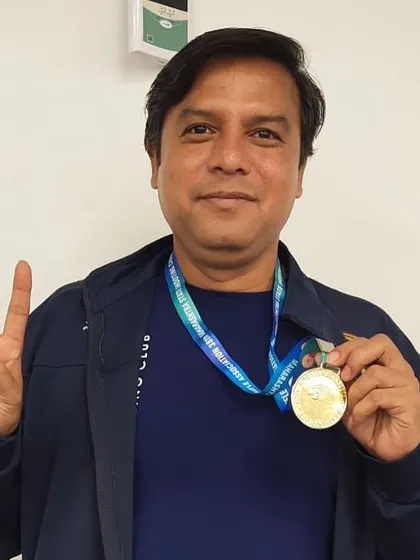 Vinod Khutade celebrates his Gold Medal win in the 10m Air Pistol Master Men category at the state championships.