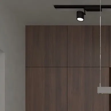 Another angle of the dark kitchen concept, emphasizing the seamless integration of the cabinetry. The design plays with light and shadow to create a moody yet functional culinary space.