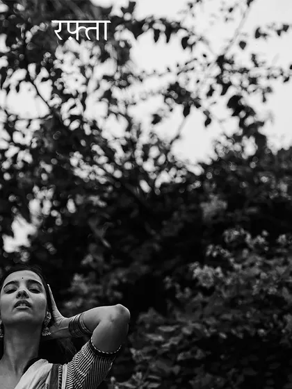 Another shot from 'Rafta', using negative space to create a sense of solitude and freedom. The focus is on the model's serene expression against the backdrop of nature.