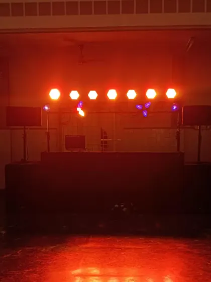 The calm before the storm. This is my console and lighting truss, all set up and ready to go. The right lighting is key to setting the mood for the entire evening.