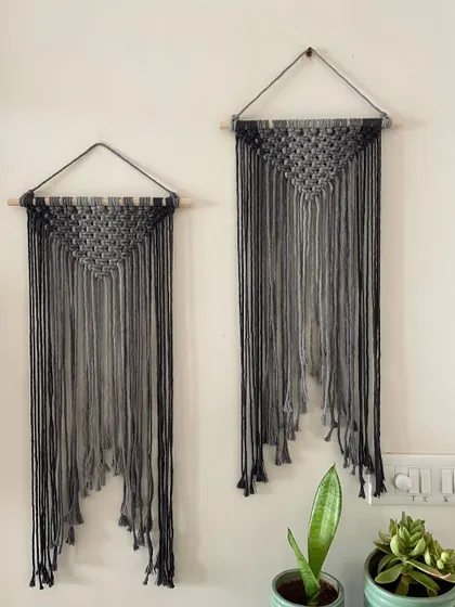My Ombré grey wall hangings are super cool and aesthetic. This shows two of them together, one slightly larger than the other. They add instant charm and a modern touch to your wall.