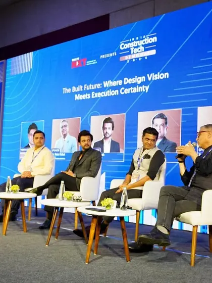 A wide shot of the panel discussion on "The Built Future". The conversation explored how technology and sustainable philosophies will shape the next decade of architecture.