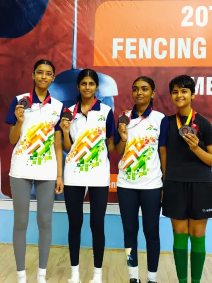 Our talented female fencers, including Anushka Ankamule, display their bronze medals at the 20th Cadet National Fencing Championship. This highlights the strength of our women's foil fencing program.
