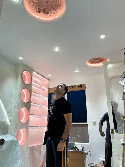 The kid's room is nearing completion. The unique lighting and custom furniture are coming together.