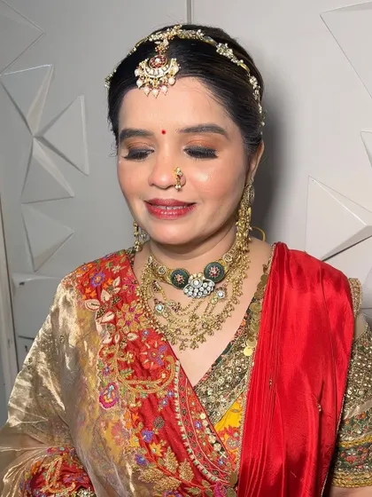A close-up of the mother of the bride's makeup. The soft smokey eye and radiant skin create a look that is elegant and celebratory.