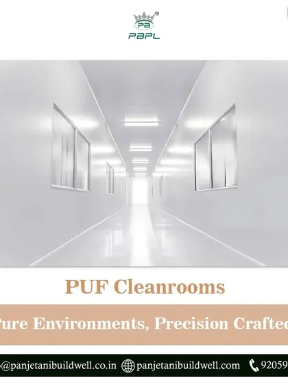 A long, sterile hallway inside one of our PUF cleanrooms. We craft pure environments with precision, ensuring our advanced solutions meet the compliance and efficiency needs of your operations.