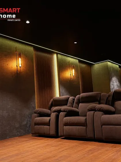 The ambient lighting in this ECR project is designed to create a warm and relaxing mood, perfect for settling in for a movie. The tiered seating ensures everyone has a great view.