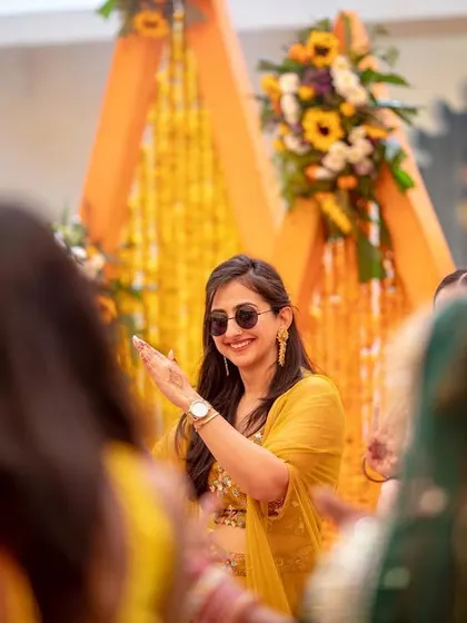 Guests enjoying the music and festive atmosphere at the outdoor Haldi ceremony.
