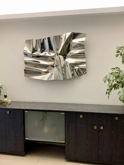 A perfect fit. This installation shows how a contemporary sculpture can complement both modern and traditional furniture.