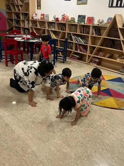 Learning about friction and movement by crawling on the floor. I use simple, playful activities to demonstrate scientific concepts.