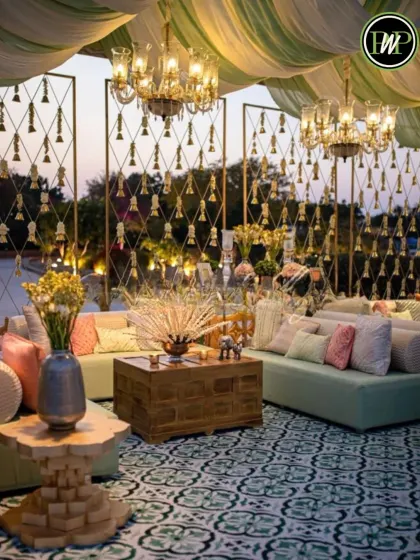 Guest comfort is paramount. We design luxurious lounge areas with plush seating, elegant chandeliers, and detailed decor like the traditional kaleera accents, ensuring your guests have a beautiful space to relax and mingle.