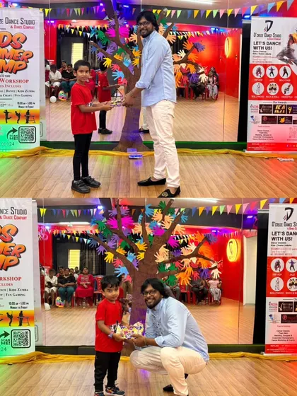 From our tallest to our smallest campers, everyone gets recognized. Here I am giving out gifts to two more students.