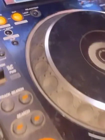 A close-up of the Pioneer DJ deck, the heart of my setup. Using pro-level gear is essential to delivering the best possible sound.