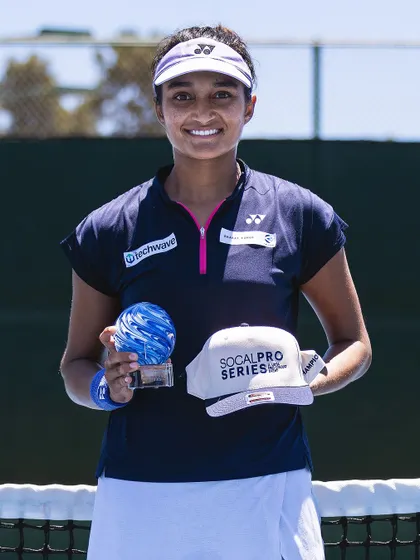 Holding the SoCal Pro Series singles trophy at the Jack Kramer Club. It was a great week where I didn't drop a set, a testament to consistent performance and mental focus, which are core parts of my coaching.
