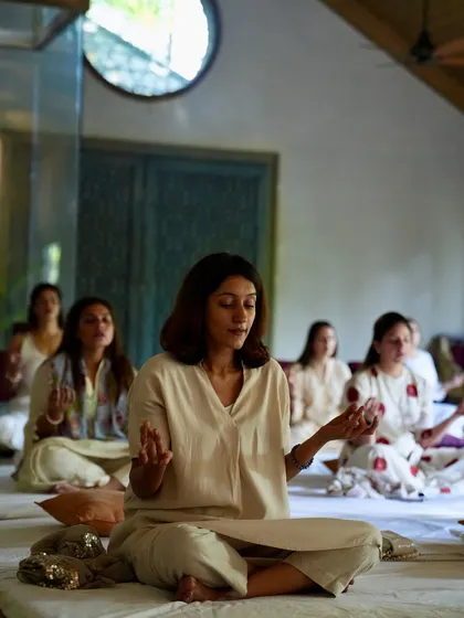 Students deep in meditation, each on their own journey but held by the collective energy of the Sangat.