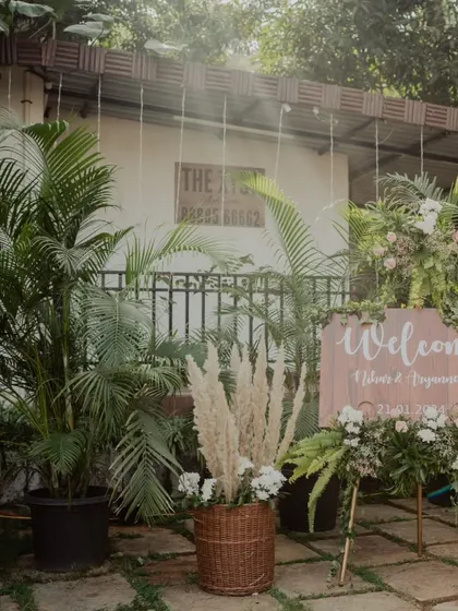 The welcome sign sets the tone for the entire event. For this engagement, we created a beautiful rustic wooden sign adorned with pampas grass and fresh flowers, perfectly matching the outdoor, natural theme.