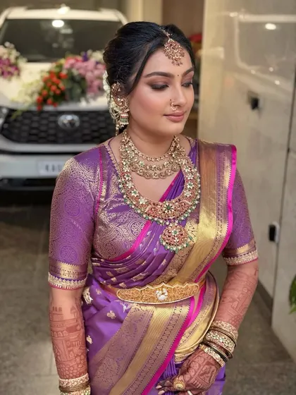 A closer look at this bride's reimagined traditional makeup. The smokey eye adds a touch of modern drama, while the skin remains luminous and natural.