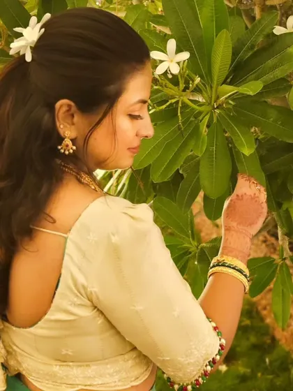 A beautiful, candid shot of my client Brunda. Her natural "no-makeup" look is perfect for this serene, outdoor setting.