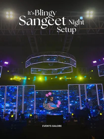 A Sangeet night needs energy and bling. This high-tech stage for Jay and Jinal featured massive LED screens with custom graphics and a floating circular truss, turning the entire venue into a dynamic concert-like experience for their performances.