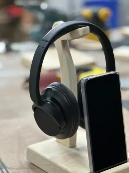 Check out this awesome headphone and phone stand made in our DIY workshop. It's a perfect example of a practical, custom project you can design and build in just one day.