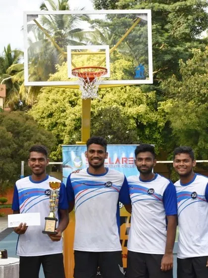 Posing with the winning trophy at the St Claret tournament.