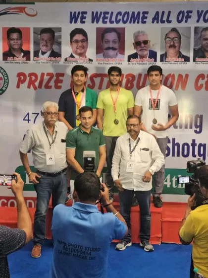 The winners' podium at the UP State Shooting Championships, celebrating the top performers.