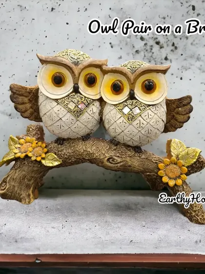 A lovely owl couple on a branch, adorned with mirror work and sunflowers. This piece makes a wonderful anniversary or wedding gift.