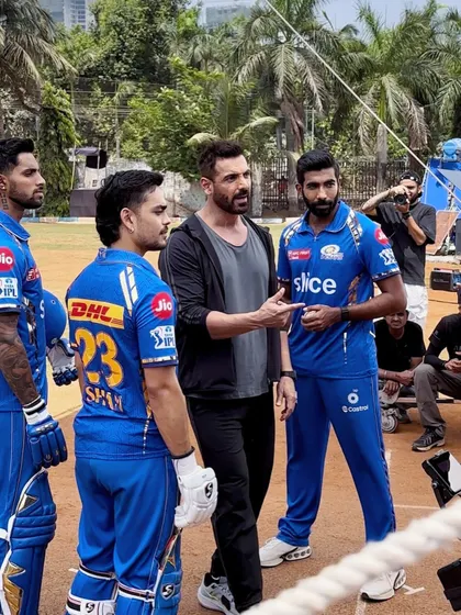 A shot from the Garnier x Mumbai Indians ad shoot, featuring John Abraham with the players. This kind of project provides real-world experience in men's styling and working with high-profile personalities.