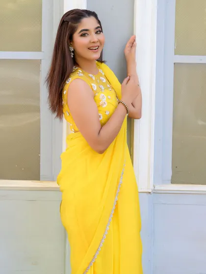 Dolled up the lovely Aishwarya Shindogi for her shoot. I created a fresh and simple look to complement her bright yellow saree.