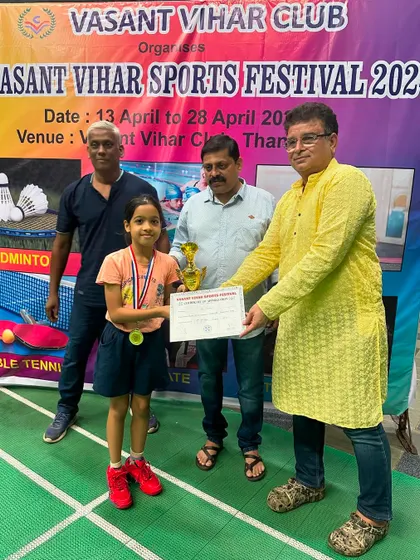 Shanaya Tavate, the winner of the Girls U-11 category, beaming with her well-deserved trophy and medal.