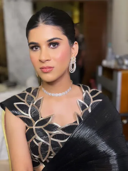 A confident and glamorous pose. This look is perfect for anyone wanting to channel their inner Bollywood star for a night.
