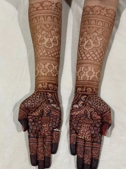 The rich, dark stain of a full bridal henna design, a result I always strive for.