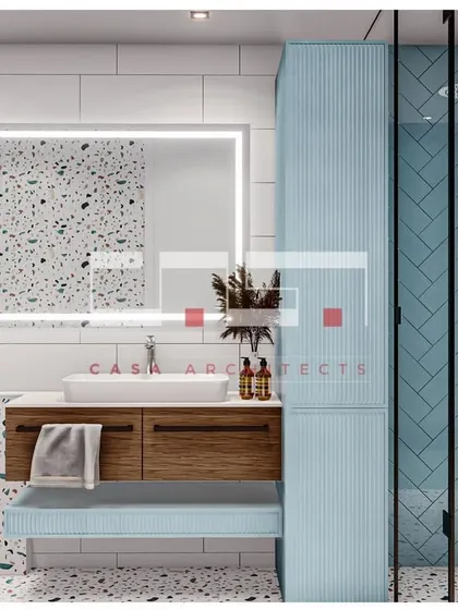A 3D render of a fresh and modern bathroom design, using a mix of terrazzo and blue herringbone tiles for a playful yet stylish look.