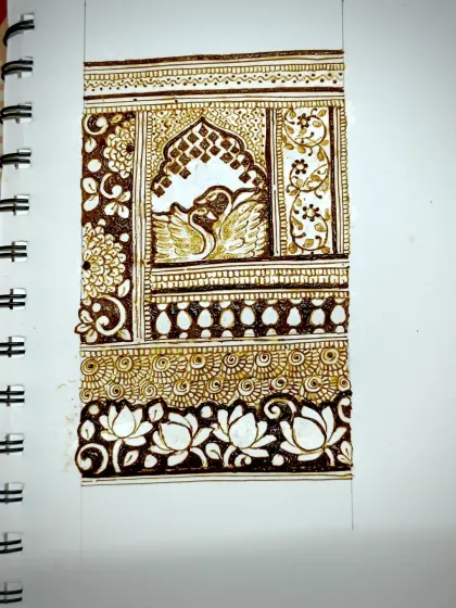 This is a design concept I sketched for a bridal arm piece. It features a pair of swans within a traditional jharokha window, surrounded by delicate floral work and a beautiful lotus border. I love bringing these story-based elements into my bridal mehendi.