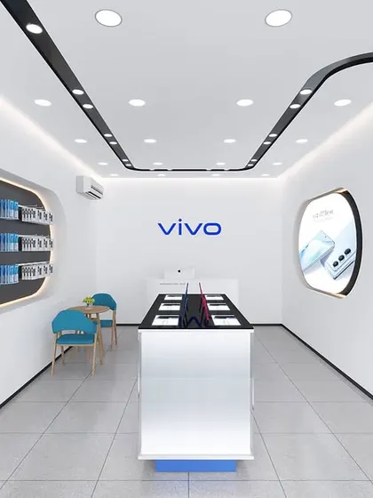 The interior render for the mobile store, featuring curved display niches and a central experience island. The design creates a futuristic and customer-friendly environment.