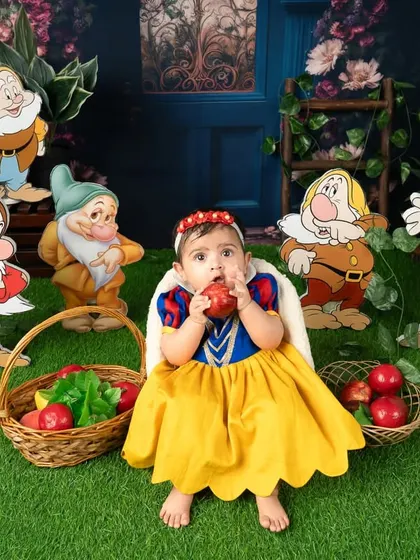 It looks like Snow White couldn't resist taking a bite of the apple. These playful moments are the best.