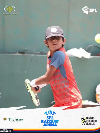 This young player shows great concentration and form as he prepares to hit a backhand during a Tennis Premier League match.