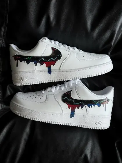 A pair shot of the galaxy drip custom sneakers.