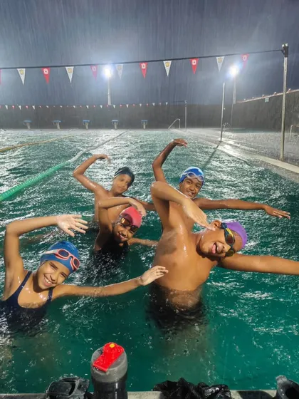 Welcoming our newest Marlins to the competitive team, even on a rainy evening. These kids earned their promotion from the pre-competitive squad through hard work and are ready to start racing.