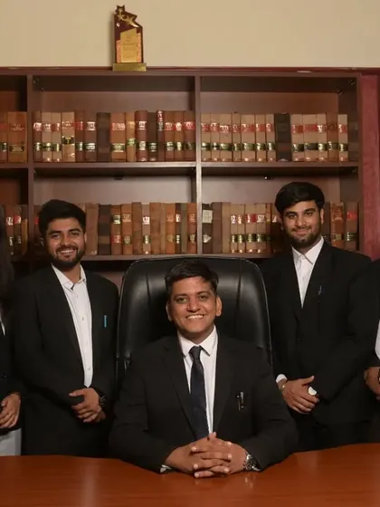 A portrait with some of my junior colleagues in my office. Mentoring them and watching them grow is one of the most rewarding aspects of my work.