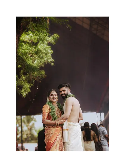 A beautiful "look back" shot of a couple after their temple wedding.