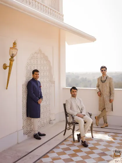 Another angle of the groom and his groomsmen, showcasing their coordinated outfits.