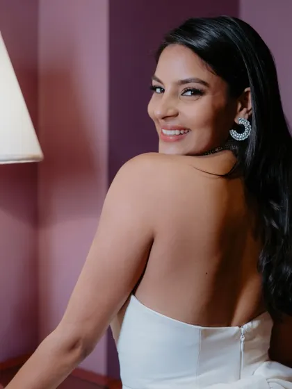 A beautiful portrait of the bride. Her simple, elegant makeup for the welcome dinner is all about looking chic and feeling great.