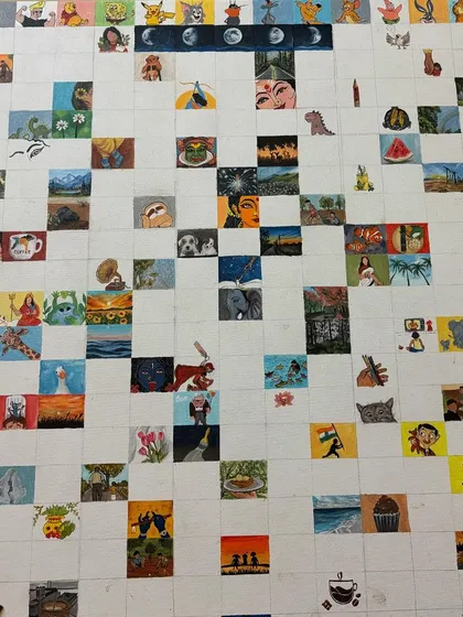 The full grid of the mini-paintings project, with many squares still waiting to be filled.