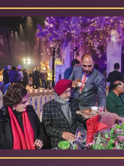 Our impeccable service in action, attending to guests at a high-end event. We ensure every guest feels valued and well-cared for.