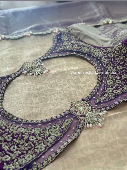 Another view of the purple sheer back blouse.
